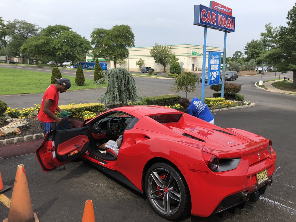Red Ferrari being detailed at Aberdeen Car Wash in Matawan, NJ.